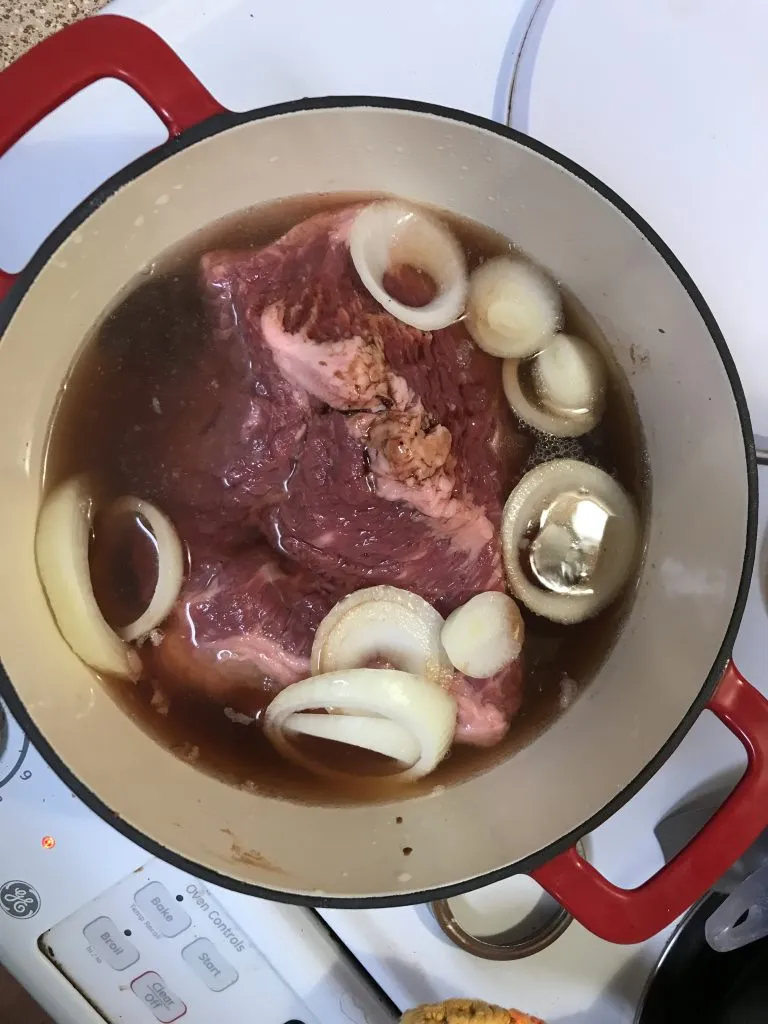 Brisket simmering with onions