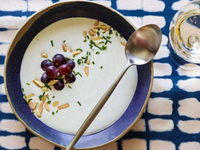 white gazpacho with grapes and chives garnish